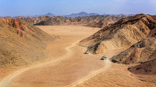 istock Two jeep in the desert 489349488