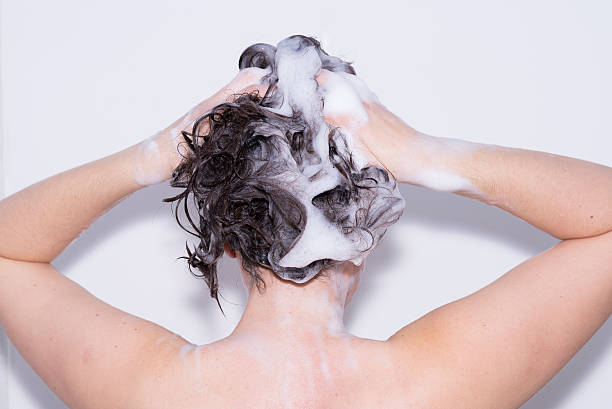 istock Girl in the shower. 489349878