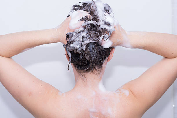 istock Girl in the shower. 489349974