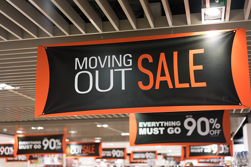 Signage of moving out sale.