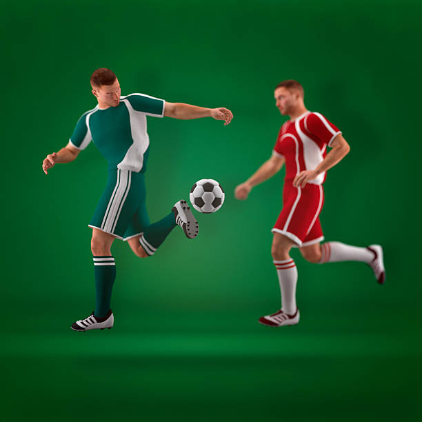 istock Soccer players against green background 489355441