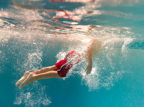 istock kid having a good time in the pool 489356723