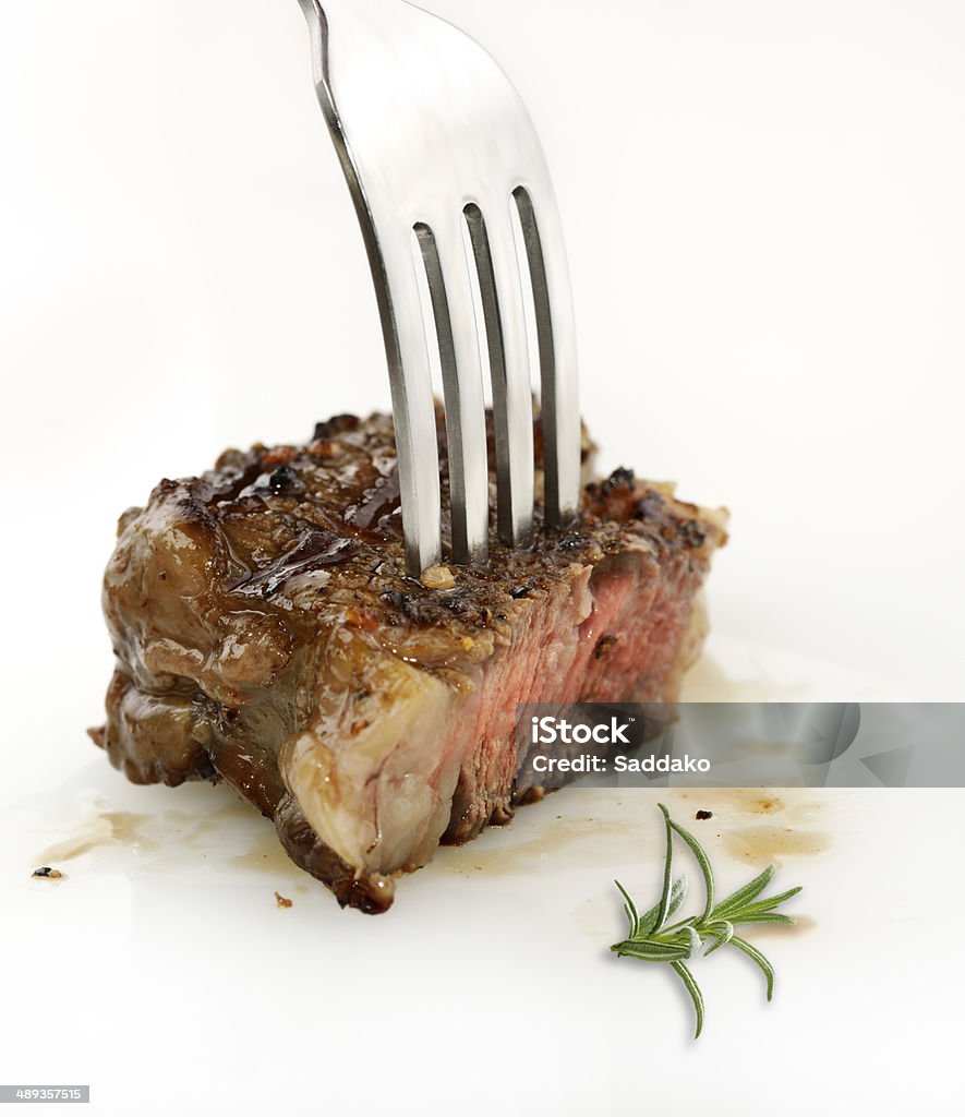 Piece Of Red  Meat Steak On A Fork Piece Of Red  Meat Steak On A Fork,Close Up Affectionate Stock Photo