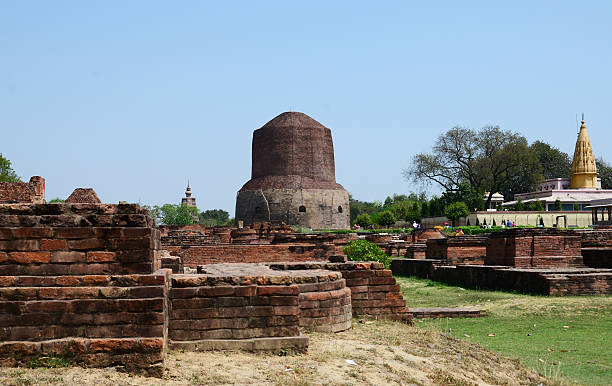 Archaeological Ruins at Sarnath India Archaeological Ruins and Stupa at Sarnath India - a pilgrimage destination for Buddhists sarnath stock pictures, royalty-free photos & images