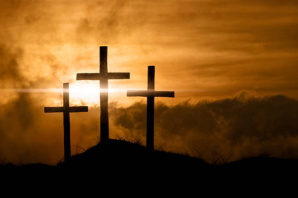 A brilliant sky illuminates the empty crosses on the day of Jesus' crucifixion.