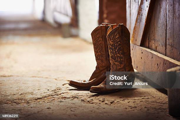 Realizado Otro Día Foto de stock y más banco de imágenes de Bota de vaquero - Bota de vaquero, Texas, El lejano oeste