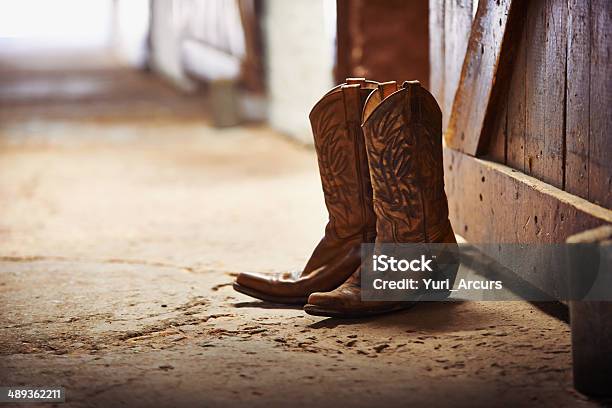 Foto de Outro Dia Concluído e mais fotos de stock de Bota de Cowboy - Bota de Cowboy, Texas, Faroeste