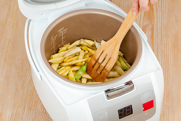 istock cooking green beans in multicooker 489381662