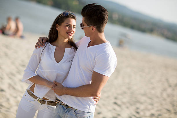 istock Young couple on the beach 489382754