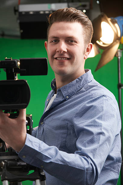 istock Portrait Of Cameraman Working In Television Studio 489383578