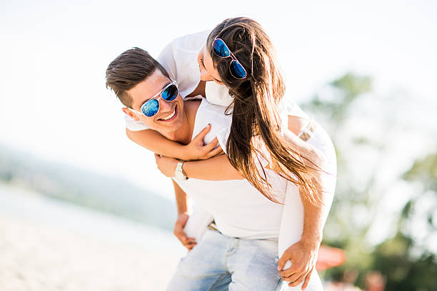 istock Young couple on the beach 489384492