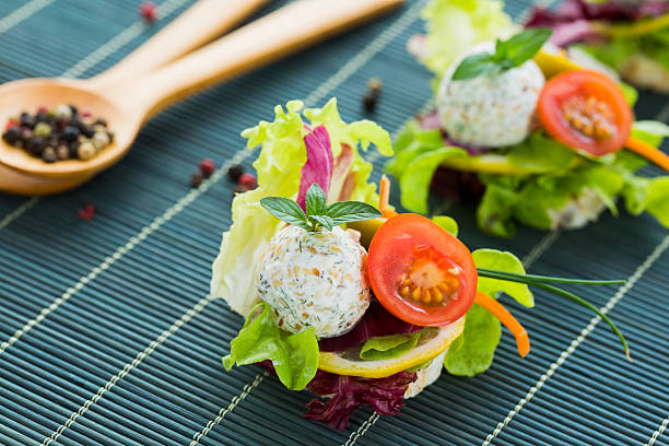 Healthy Rice Canape with Protein Cheese and Cherry Tomato stock photo