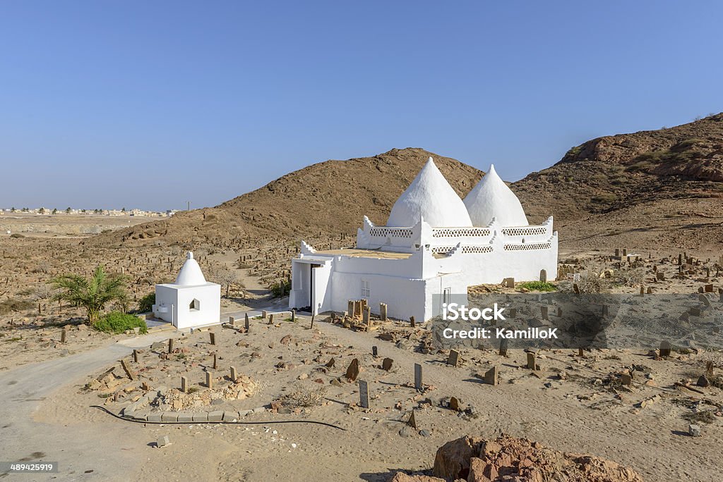 Tomb of Bin Ali in Mirbat, Dhofar region (Oman) Tomb of Bin Ali with cemetery in Mirbat, Dhofar region (Oman) Oman Stock Photo
