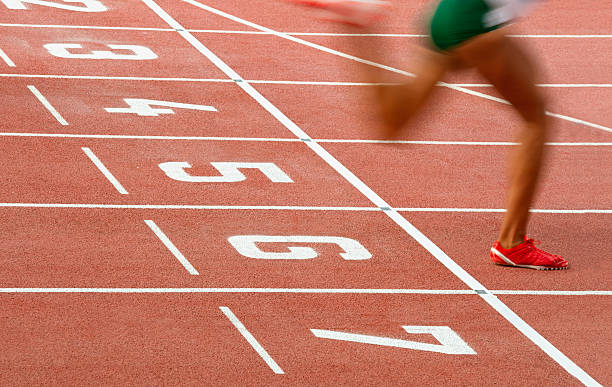 istock Athlete Crossing the Finish Line 489426109