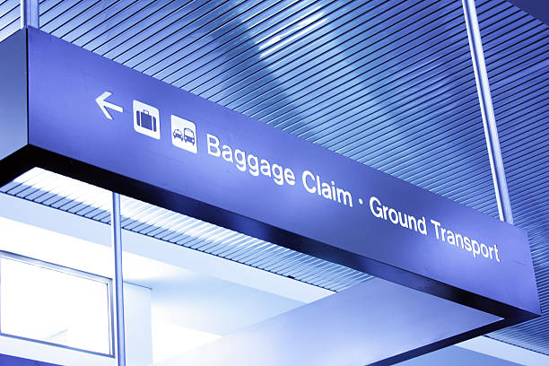 istock Baggage claim sign at airport 489426291