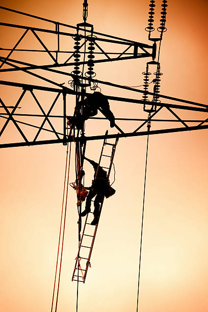 istock maintenance of high voltage power line 489426585