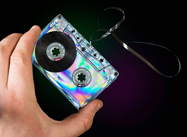 istock Hand holding vintage cassette tape 489428649