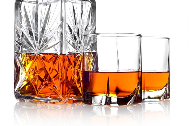 istock Whisky in a carafe and two glasses isolated on white 489429457