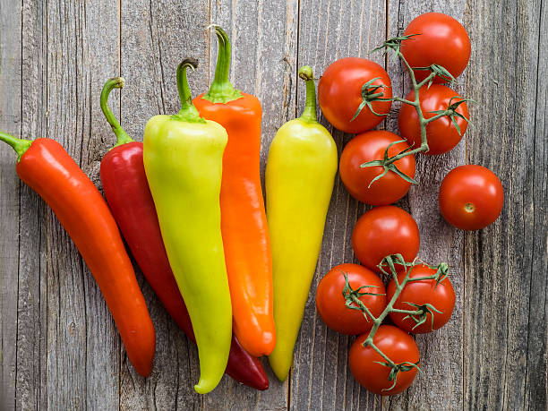 Colorful Peppers and Campari Tomatoes stock photo