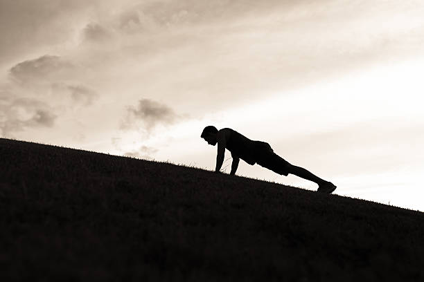 istock Young man exercising in the park 489431046