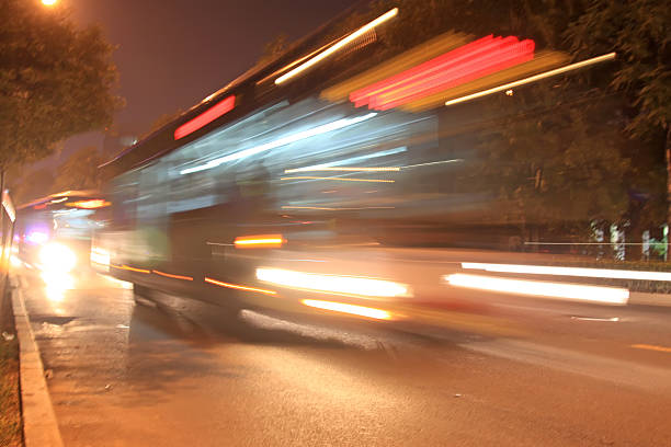 istock light trails on the modern street at night 489431195