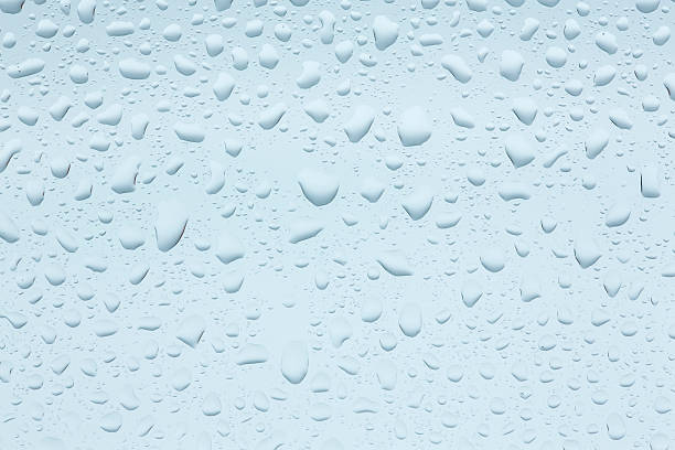 istock Water Drops Rain Droplets On Glass Window Background. 489433846