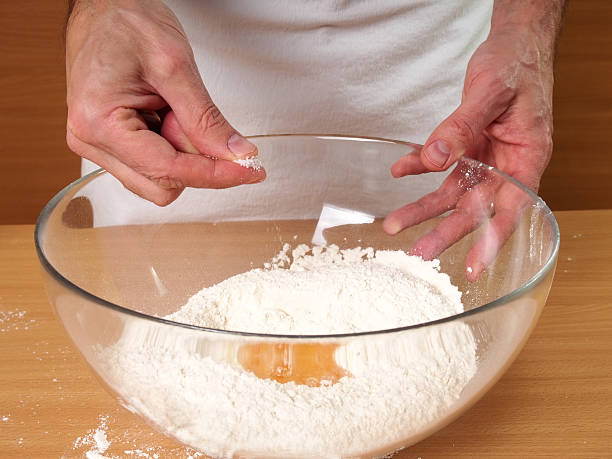 istock Salting Flour. Making Dough. Preparation Meat Dumplings. 489435956