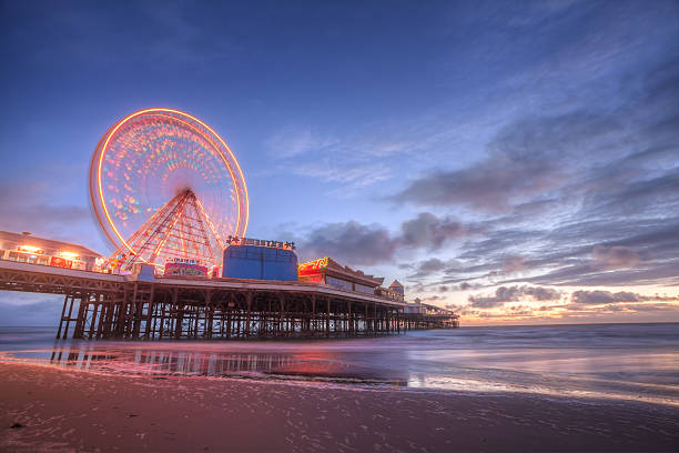 Blackpool, Central Pier.  A Long Exposure taken on a Sunset Evening in September of British Seaside Resort. Blackpool's Central Pier. lancashire stock pictures, royalty-free photos & images