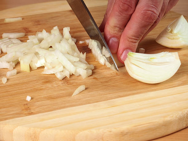 istock Slicing Onion. Making Stuffing. Preparation Meat Dumplings. 489436078