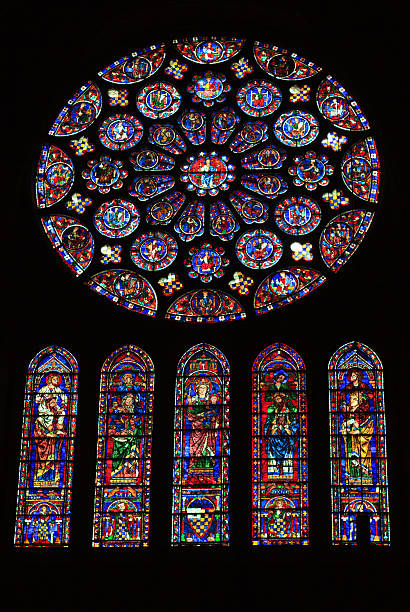 Chartres Cathedral Rosette Stained Glass (Interior), France Chartres Cathedral rosette and stained glass panel (Interior shot), France, dating from the 12th century. A sliver of copy space at the bottom of the frame. chartres cathedral stock pictures, royalty-free photos & images