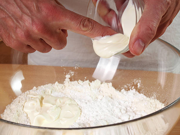 istock Add sour cream. Making Apple Pie Tart Series. 489436790