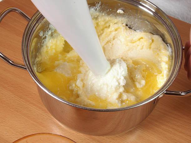 istock Mixing melted butter and cheese cream 489437928