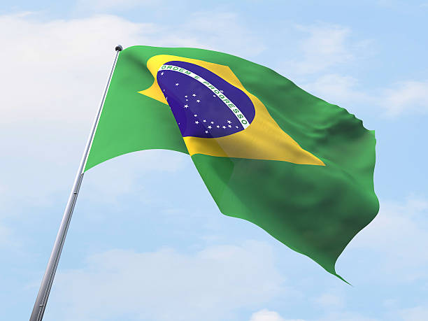 istock Brazil flag flying on clear sky. 489479350