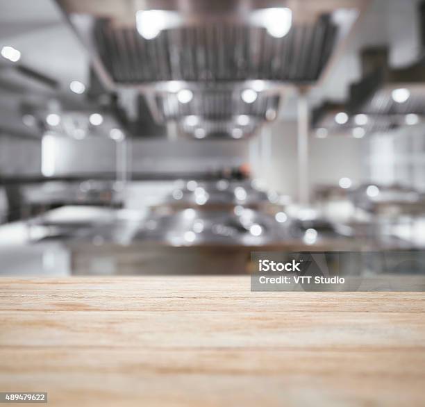 Table Top Counter With Blurred Kitchen Background Stock Photo - Download Image Now - Commercial Kitchen, Kitchen, Backgrounds