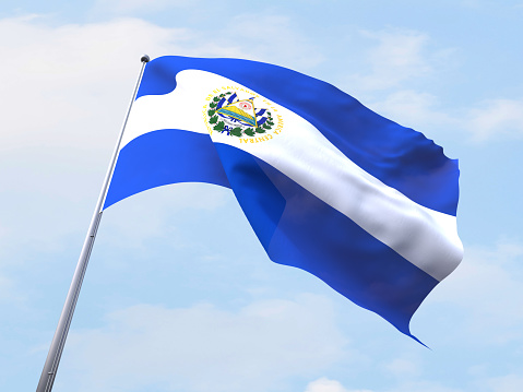 El Salvador flag flying on clear sky.