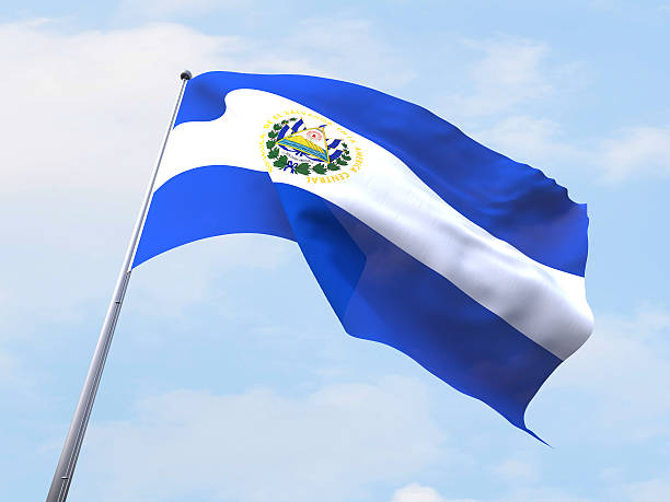 флаг сальвадора flying on ясное небо. - salvadoran flag стоковые фото и изображения