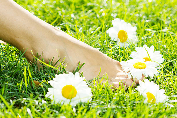istock Beautiful Young Woman lying on a field 489479882