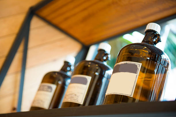 istock brown bottle on the Shelves 489480434