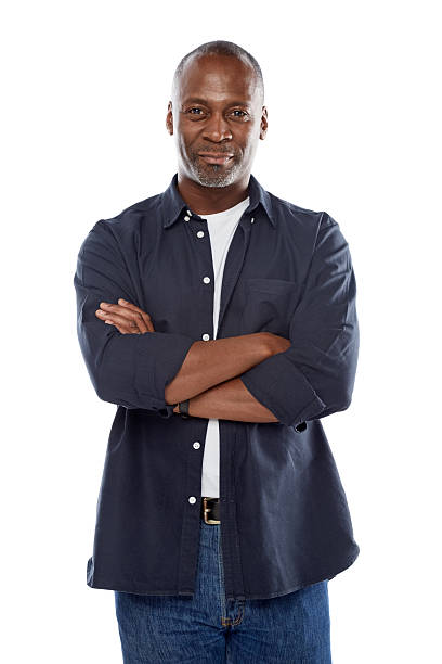 istock Handsome african man standing with his arms crossed 489481289