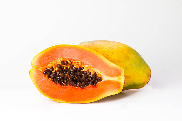 istock sliced and whole  fresh papaya 489482810