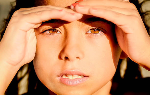 istock Beautiful little girl looking  far away 489483094