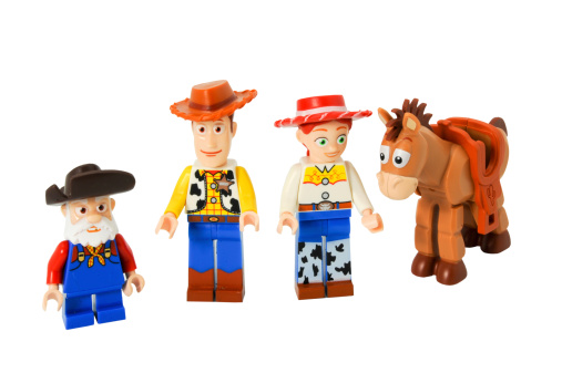 Adelaide, Australia - April 14, 2014:  A Studio shot of Toy Story Lego minifigure characters from the Toy Story movies. Featuring the characters Stinky Pete, Woody, Jessie and Bullseye. The Toy Story series of movies were very popular with children, a series of three movies were made and released world wide by Disney Pixar.
