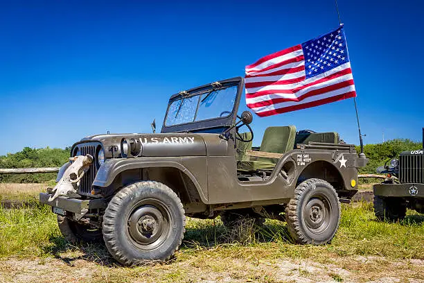 Photo of Old US Army Jeep with flag