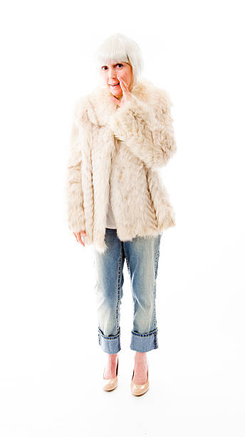 istock Senior woman whispering 489485601