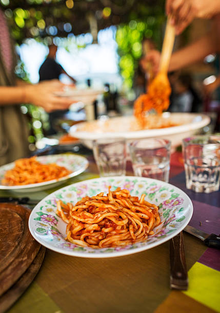 Pasta amatriciana is ready Real pasta alla matriciana is ready on the table. Typical pick from central Tuscany. all'amatriciana stock pictures, royalty-free photos & images