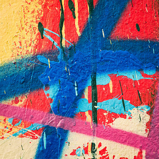 bunte farbe makro - graffiti surface level color image paint stock-fotos und bilder