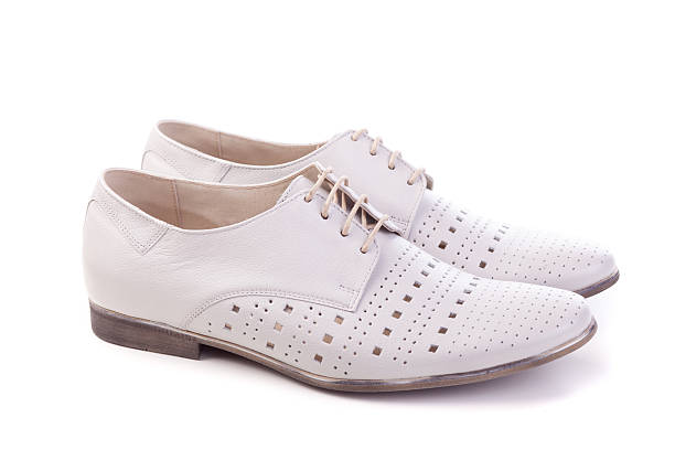 istock man's shoes isolated on white 489488325