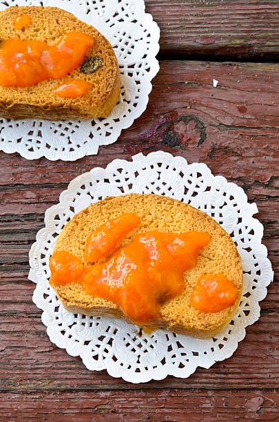 istock Fresh baked biscottis with raisins and apricot jam 489488454