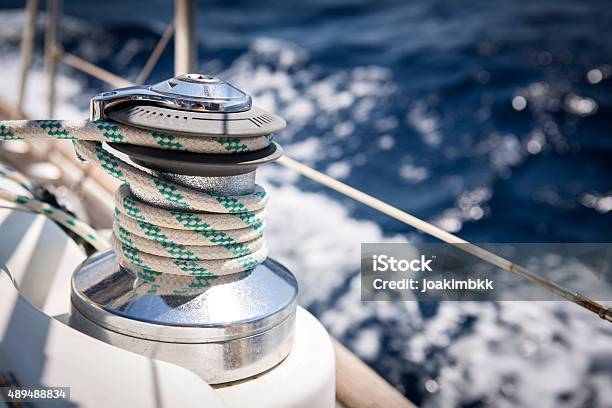 Sail Boat Winch With Rope While Sailing Stock Photo - Download Image Now - 2015, Boat Deck, Cable Winch