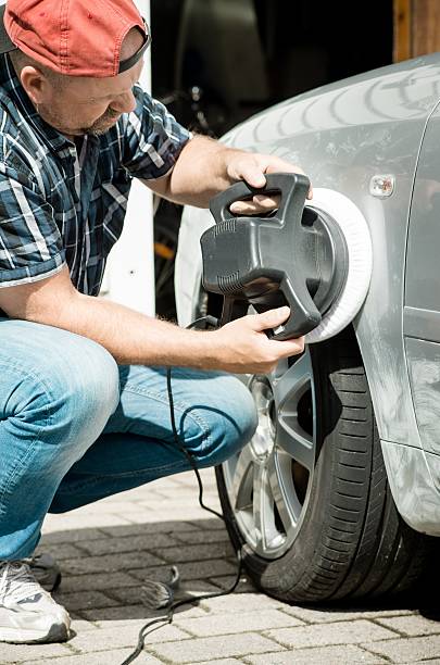 istock Man polishing a car 489491104